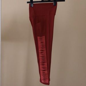 Athleta Salutation 7/8 Tight in Powervita  - size Medium.  rust with salmon trim